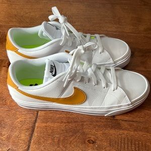 Brand new white Nikes